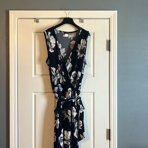 Venus jumpsuit. Floral wrap with belt. Large.